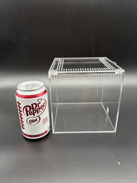Burrow Buddy Acrylic Enclosure, 6 x 6 x 6 in clear acrylic enclosure shown beside a 12 oz soda can for size reference