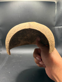 Coconut Hide, in hand for scale