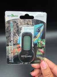 Repti Zoo SH150 digital thermo-hygrometer, packaged front held upright