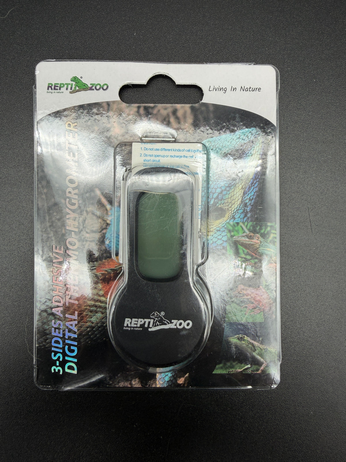 Repti Zoo SH150 digital thermo-hygrometer, packaged front on tabletop